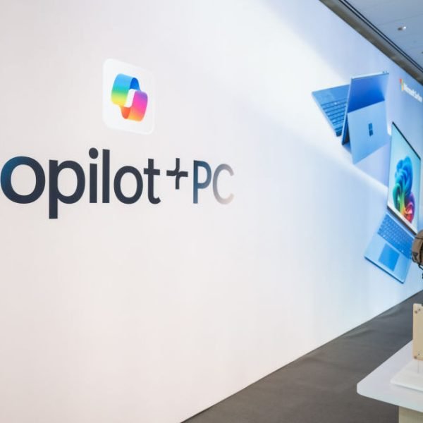 An attendee in the demo space for the Copilot+PC at the Microsoft campus in Redmond, Washington, US, on Monday, May 20, 2024. Microsoft Corp. chief executive officer Satya Nadella is betting a new generation of computers with specialized artificial intelligence chips and faster performance will revive the long-running rivalry between Windows PCs and Apple Inc.'s Mac. Photographer: Chona Kasinger/Bloomberg via Getty Images